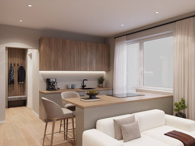 Interiér 1-pokojového bytu s podlahou s dřevěným dekorem a kuchyňským koutem.