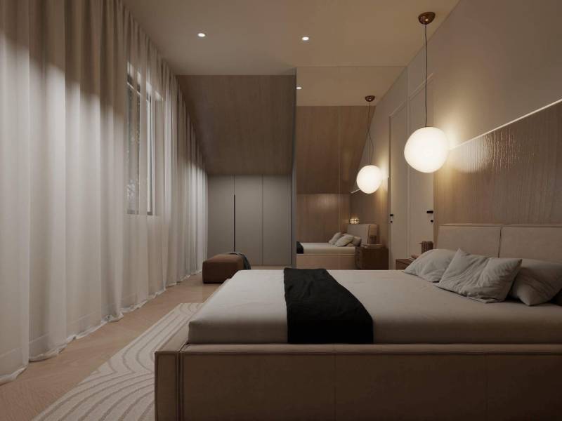 Ložnice v rodinném domě s jemným osvětlením a podlahou s dřevěným dekorem.