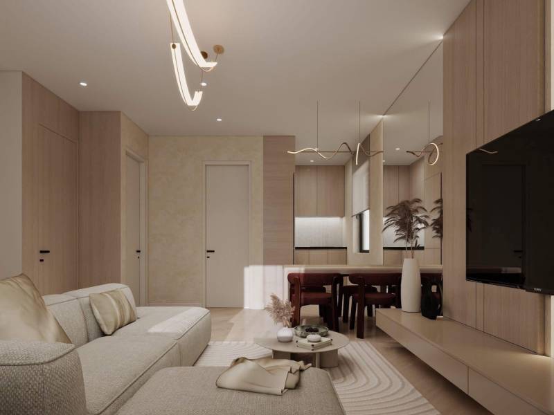 Interiér rodinného domu se světlou sedačkou, podlahou s dřevěným dekorem a minimalistickým osvětlením.