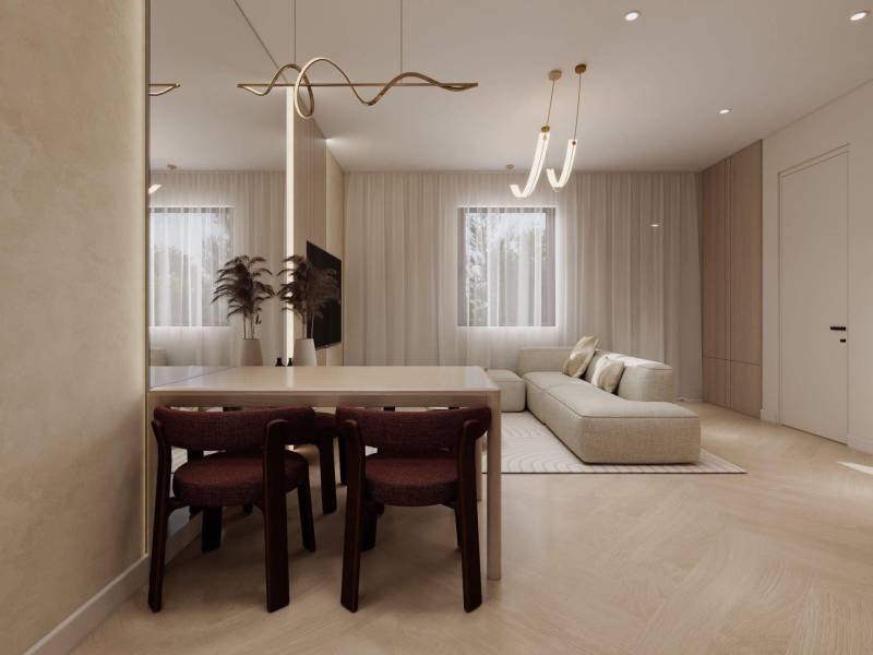 Interiér rodinného domu s pohovkou, jídelním stolem a podlahou s dřevěným dekorem.