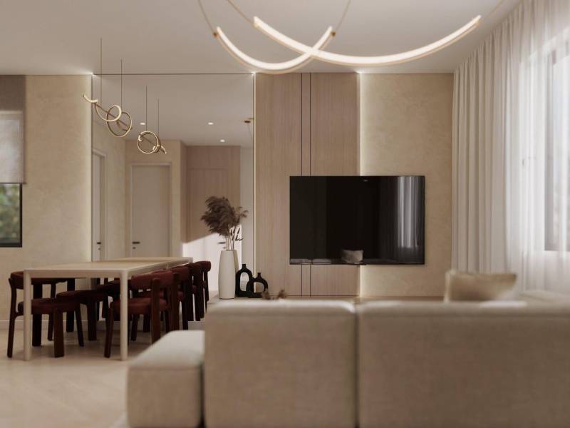 Obývací pokoj rodinného domu s podlahou s dřevěným dekorem a elegantním osvětlením.