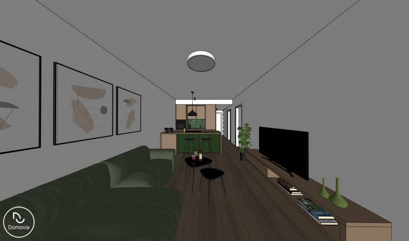 Obývací pokoj s pohovkou, TV, kuchyňskou linkou a podlahou s dřevěným dekorem v 2pokojovém bytě.