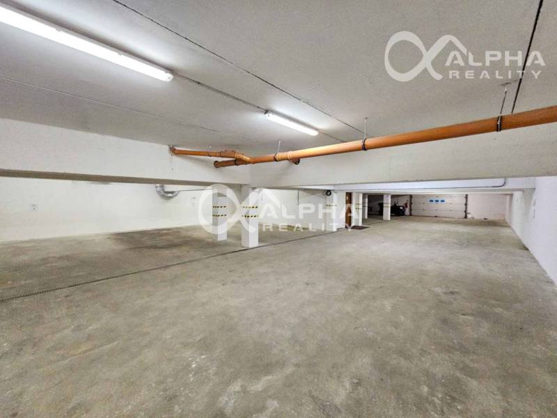 Parkovací místa v podzemní garáži pro 2pokojový byt.