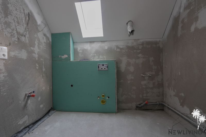 Rekonstrukce koupelny ve 4-pokojovém bytě s instalací sádrokartonu.