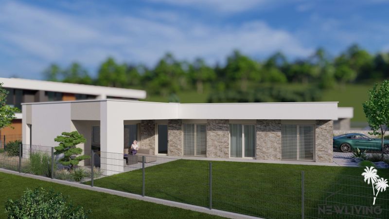 Rodinný dům v Modrovce s moderním exteriérem, terasou a zeleným dvorem.