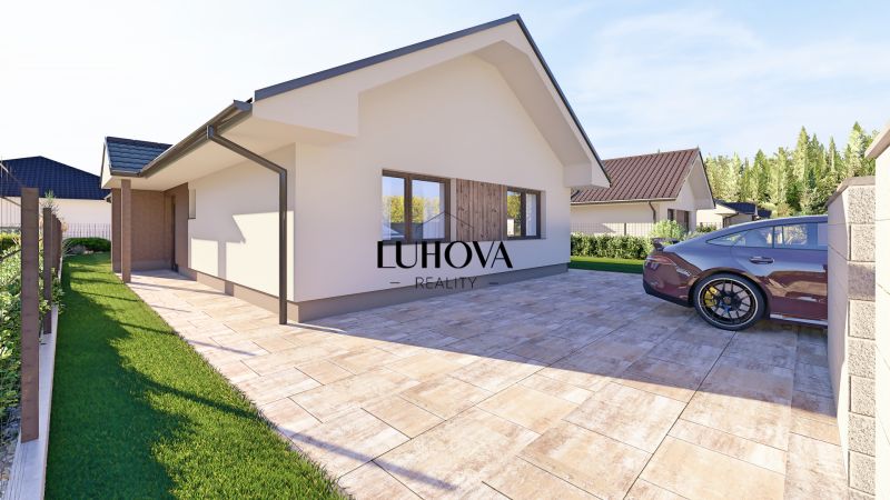 Rodinný dům v Tuchyni na ulici Tuchyňa s terasou a parkováním na vydlážděné ploše.