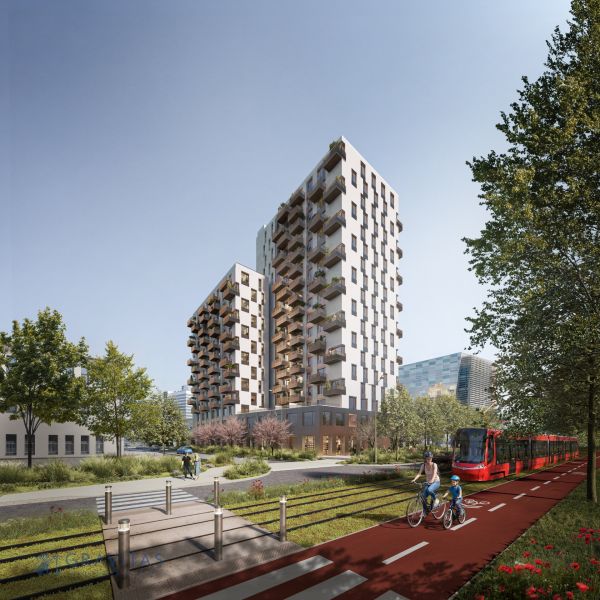 Novostavba s balkony, cyklista a tramvaj na Mlynských Nivách v Bratislavě-Ružinově.